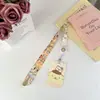 Cordão retrátil de desenho animado com fivela de puxar fácil, conjunto de cartões no atacado, corda longa para pescoço, crachá ajustável Sanrio cabeça grande
