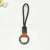 Llavero Creativo Anillo Cordón de Cuero Gamuzado Llavero Cubierta para Llave de Tarjeta Colgante Pulsera Anillo Unisex