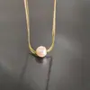 Colar de aço titânio moda simples pérola camada dupla feminino alta qualidade corrente clavícula pérola luxo leve celebridade da internet fabricante de colares