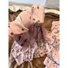 Dulce y seductor conjunto de pijama de seda helada con estampado de lunares de cebra para mujer, nuevo conjunto de satén con cárdigan y pantalones largos para el hogar, verano 2026
