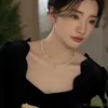 Collar con colgante de cuentas retorcidas de doble capa estilo francés para mujer, nuevo modelo 2026, cadena de clavícula de alta gama, accesorio de nicho de lujo ligero