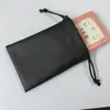 Bolsa de Empaque Profesional para Auriculares al por Mayor del Fabricante, Bolsa Impermeable de PU, Bolsa de Almacenamiento para Cable de Datos Bluetooth, Bolsa Negra de PU de Alta Gama