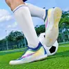 Zapatos de fútbol de punto sin costuras transfronterizos, unisex, caña baja, tacos AG para césped natural exterior, tacos TF para césped artificial, disponibles para venta al por mayor