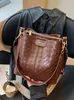 Bolsas de nicho de alta gama de moda para mujer 2026 nuevos bolsos de hombro de moda bolsos cruzados bolsos tipo cubo versátiles