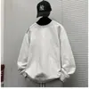 Sudadera nueva para hombre con corte holgado y tridimensional, cuello redondo, diseño deconstruido limpio, estilo americano, adecuada para primavera