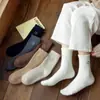 Medias gruesas y cálidas con forro polar para Otoño e Invierno, terciopelo australiano que no suelta pelusa, calcetines de confinamiento, calcetines de rizo hasta la mitad de la pantorrilla bordados con cara sonriente para mujer