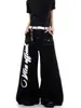 Calça jeans de corte amplo, unissex, com estampa de grafite estilo americano com asas, costura reforçada, design de outono, versátil, com múltiplos bolsos e comprimento até o chão.