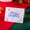Tarjeta de felicitación navideña transfronteriza Popular en Xiaohongshu Nochebuena Bendición escrita a mano Decoración Tarjeta pequeña tridimensional Regalo Venta al por mayor