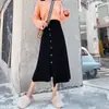 Saia Midi de Malha Preta Feminina 2026 Nova Outono/Inverno Cintura Alta Emagrecedora Linha A Saia Lã Irregular Bainha Larga Saia Longa