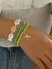 Conjunto de Pulseras Estilo Playa Bohemia Verano Dopamina Estrella de Mar Cuentas de Semilla Concha Cuerda de Mano Juego de Siete Piezas para Mujeres