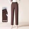 Pantalones casuales, sencillos y elegantes para mujer con cintura elástica y corte recto, con una costura central delantera, perfectos para ir al trabajo.. Nueva colección otoño 2026, de tiro alto y adelgazante