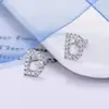 Comercio electrónico transfronterizo superventas 26 letras inglesas pendientes de circonita agujas de plata 925 pendientes exquisitos de diamantes completos pendientes