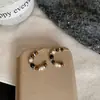 Pendientes de Ojo de Tigre Maillard Otoño e Invierno para Mujer, Pendientes de Botón Elegantes con un Toque de Lujo, Lujo Ligero, Nuevos Accesorios Populares para Orejas 2026