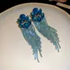Aretes de aguja plateada con diamantes, aretes de borla con forma de gota de agua ovalada, modernos y exquisitamente elaborados, diseño versátil, venta al por mayor