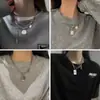 Cadena de collar con colgante de oso alfabético japonés y coreano para otoño/invierno, cadena hip-hop de estilo ins de moda para suéteres, accesorio decorativo para hombres y mujeres