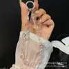 Ins Cadena para Teléfono Móvil Carruaje de Corona Corazón Circonita Campana Divertida Cadena para Teléfono Móvil Cadena de Perlas de Cristal Mujeres Venta al por Mayor