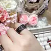 Anillo de estilo oscuro pequeño de piedra de sangre roja imitación para chica Hip-Hop Camelia Bañado en Oro Negro Pulsera de Hombre Cruz Estrella