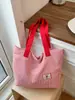 Bolsa de mano casual de nailon estilo coreano, bolso de mano de moda con estampado de letras, popular bolso de hombro de rayas reversible para mujer