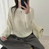 Suéter de punto calado con cuello redondo para mujer 2026 primavera y otoño nuevo estilo color prenda exterior cárdigan suéter holgado de manga larga top de color liso