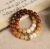 Molienda en seco material viejo combinación de colores amarillo y verde cuentas viejas círculo simple alrededor del dedo placa blanda para jugar con pulsera de valor de color para mujer flor de albaricoque para hombre lluvia