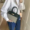 Novas bolsas femininas 2026, bolsas de platina da moda de alta qualidade, bolsas Kelly para ombro e transversal transfronteiriças