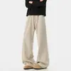 Pantalones de chándal anchos para hombre de color avena con estampado de espiga, cordón, dobladillo curvo, corte holgado y un estilo relajado hasta el suelo