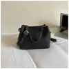 Bolso tipo cubo de moda y versátil para mujer, nuevo estilo de verano para ir al trabajo, bolso de hombro moderno con un toque vintage de alta gama, bolso de mano