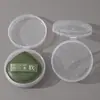 Caja redonda transparente portátil y transpirable, alto valor estético, transpirable con agujeros, práctica para uso doméstico, caja vacía para almacenamiento en casa
