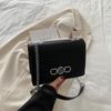 Bolsa quadrada pequena simples estilo ocidental, primavera 2025, nova bolsa francesa de nicho, cor sólida, retrô, moderna, bolsa transversal de ombro