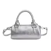 Los bolsos pequeños de color liso de moda para mujer son populares este año, 2026 nuevos bolsos cruzados versátiles, bolsos de mano sencillos y bolsos de cilindro modernos