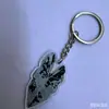 Stock directo de fábrica creativo hoja artificial acrílico plano llavero accesorio colgante decoración de mochila caricatura