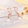 Pendientes de plata de ley S925 de Qiao Lanxuan, pendientes de perlas huecas con lazo estilo coreano, elegantes y nuevos pendientes de celebridades de Internet.