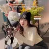 Chenxu Clothing, Cidade de Dongguan, Província de Guangdong: Suéter feminino de outono e inverno com gola alta e bordas franzidas, top de tricô para usar em camadas