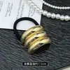 Sentido de Diseño Minimalista Anillo para el Cabello Cabeza de Bola de Aleación Cabeza de Tendón de Goma Cuerda para el Cabello Sentido Avanzado Lazo para el Cabello Anillo para el Cabello Cuerda para el Cabello Cubierta de Cuero para Mujer