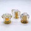 Los fabricantes suministran tapas de botellas de perfume de lujo ligero de alta gama, pegamento K, acrílico, PP, tapa de perfume tipo corona, se puede vender al por mayor, muestra