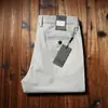 Pantalones de negocios casuales para hombre de primavera y verano 2023, delgados, de alta gama, brocado de algodón, seda helada, sin planchar, antiarrugas, rectos, holgados, de caballero