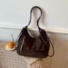 Outono de 2026 novo vintage de alta qualidade moda versátil feminina de grande capacidade dupla alça, alça única, transversal bolsa atacado bolsas femininas