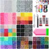 Caja de 24 compartimentos moderna y popular de diamantes de resina jelly de color AB con base plana, empaquetada para arte de uñas DIY, accesorios pequeños, venta al por mayor