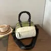 Bolso de Hombro Único para Mujer Se Puede Usar Cruzado para Ir al Trabajo Estilo Concha Mochila Pequeña Bolso de Mano Pequeño para Salir Simple Nuevo Artículo de Otoño 2026