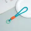 Llavero de cordón para teléfono simple y corto con bloques de color, accesorio anti-pérdida de cuerda tejida multicolor para funda de teléfono universal