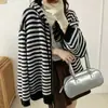Moda de otoño suéter de punto a rayas con capucha y cordón grueso abrigo para mujer estilo europeo y americano top versátil casual holgado coreano