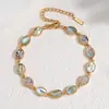 Novo modelo de comércio exterior, sensação de luxo leve e alta qualidade, pulseira de concha de abalone, pulseira de aço inoxidável com concha branca iridescente, requintada e versátil, atacado