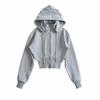Suéter retro de estilo americano con capucha para mujer otoño e invierno Nuevo cintura ajustada corte slim color sólido cremallera cordón abrigo corto top de moda
