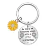 Llavero europeo y americano transfronterizo girasol anima llavero de acero inoxidable para enviar a niños a novias con letras de regalo a mano
