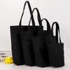 Amazon se especializa en Bolsa Tote de Lona Negra al por Mayor Bolsa de Hombro de Algodón Bolsa de Regalo para Compras Lona Cierre de Cordón Bolsillo con Solapa Pantalones