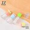 Servicio de Pedidos Jinze: Tapa Redonda en Forma de Flor, 4 Tipos de Botellas Disponibles, Se Puede Colgar con una Cadena, Tubo para Brillo de Labios, Material de Empaque de Plástico