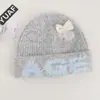Gorro de hilo de perlas de mezcla de lana de alta calidad coreano, otoño e invierno, adelgazante, gorro para clima frío, gorro de punto con patrón de letras, gorro holgado