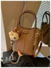 Bolsa Casual Nova da Moda 2026, Bolsa Saco Simples e Moderna, Bolsa de Ombro e Transversal Única para Mulheres da Temporada de Primavera