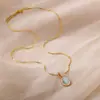 Colar Oval de Aço Titânio de Entrada Simples de Luxo Nicho Pingente Olho de Gato Corrente da Clavícula Design Elegante Joia de Alta Qualidade