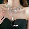 Collar de perlas con forma de mariposa estilo retro francés, elegante y moderno, con cadena de clavícula, versátil y de alta gama.